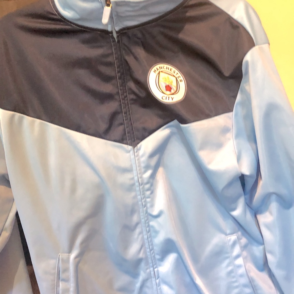 Excellent authentic Manchester City sport jacket only worn one time!